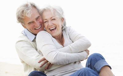Smiling Couple with Dental Implants
